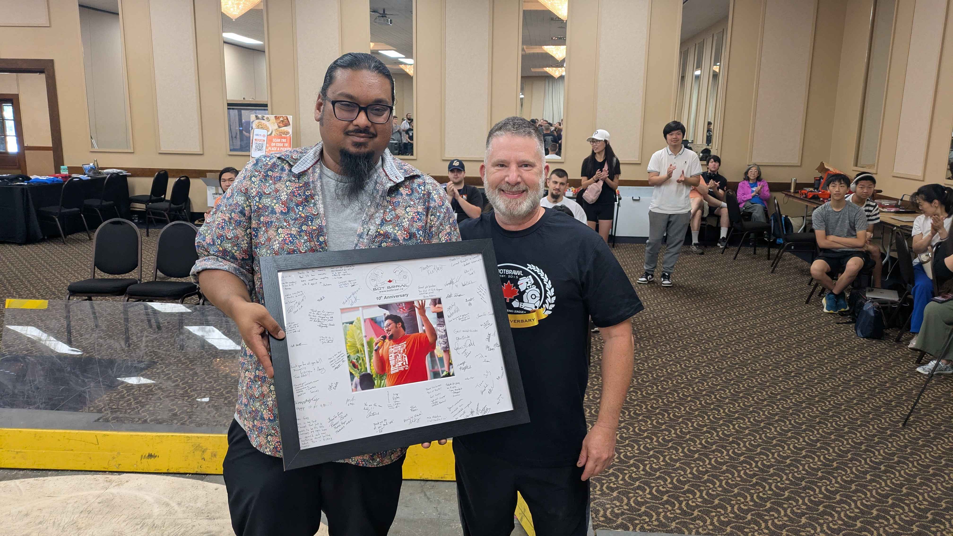 Ravi receiving BotBrawl 10th anniversary community recognition